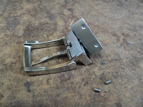 reversible belt buckle replacement parts.